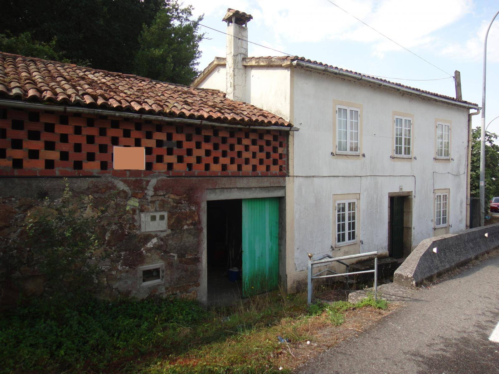 CASA DE PIEDRA CON TERRENO AL LADO DE SANTIAGO
