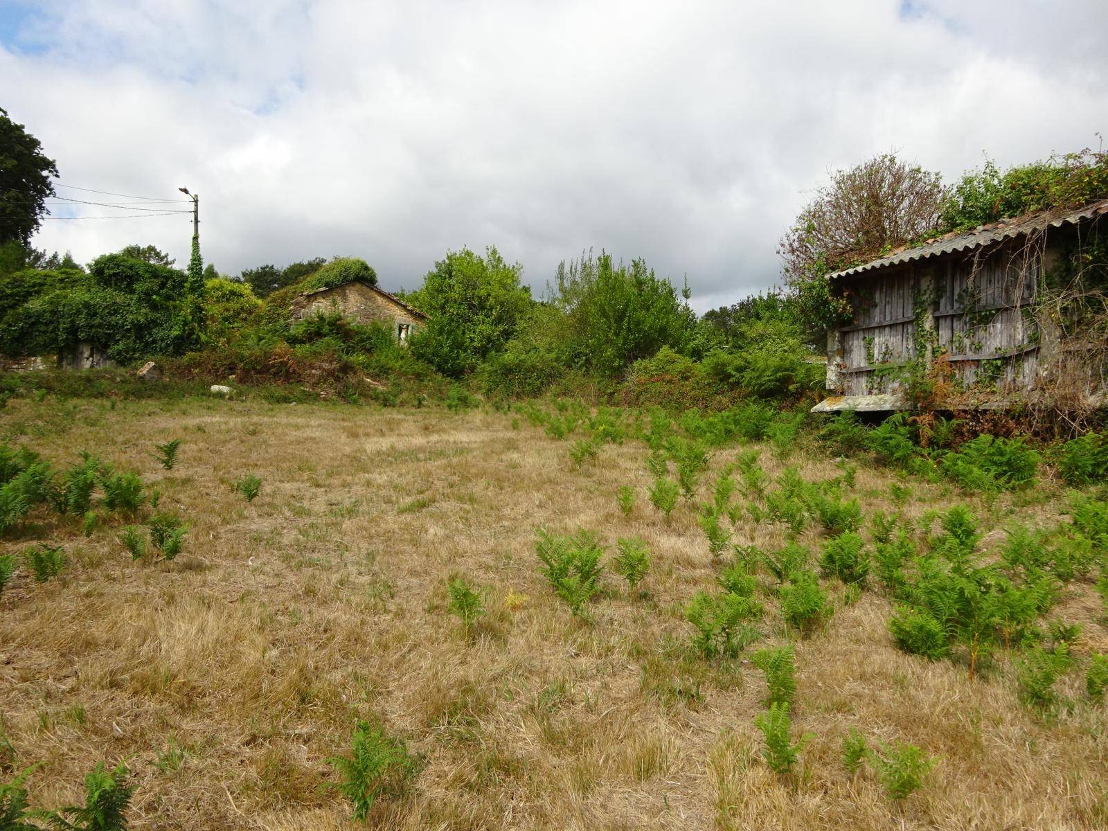 CASA DE PIEDRA CON TERRENO CERRADO ZONA DE VICESO, BRION